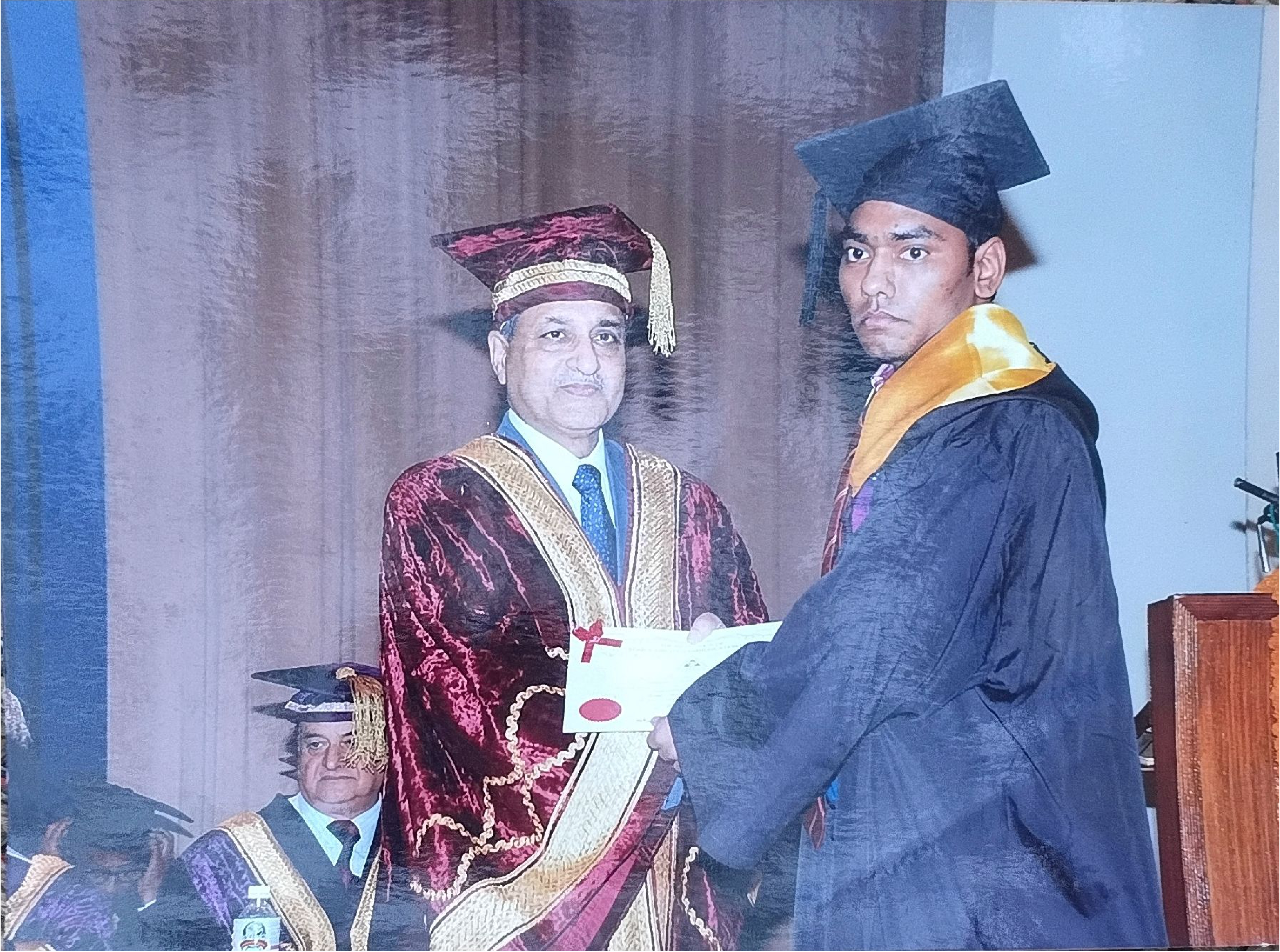Receiving academic recognition during a convocation ceremony