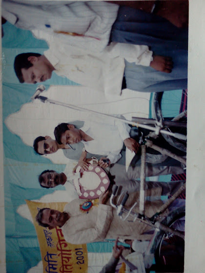 Receiving a shield during the General Knowledge Competition award ceremony